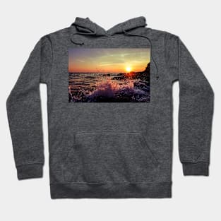 Sunset and splashing water Hoodie